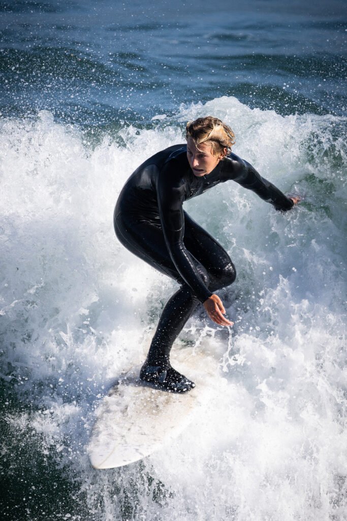 Young Surfer Riding a Wave at Steamer Lane in Santa Cruz, California