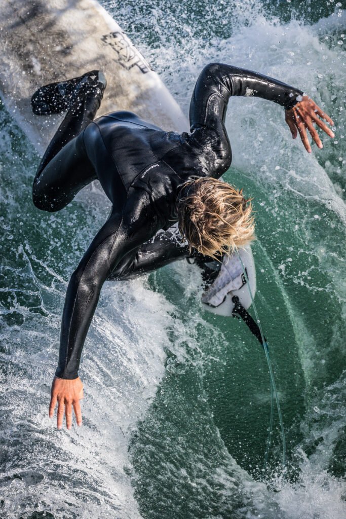 Surfer in Black Wetsuit Rides Wave at Steamer Lane Santa Cruz California Ocean Surf
