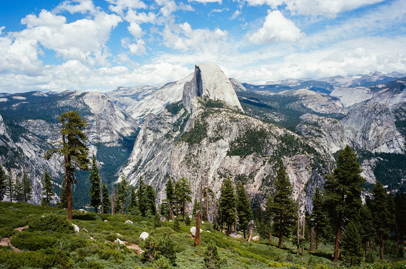 Half Dome and Sierra Nevada mountains from Yosemite National Park photographed on 35mm film Half Dome and Sierra Nevada mountains from Yosemite National Park photographed on 35mm film